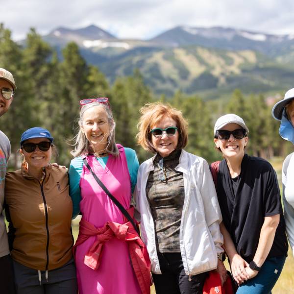 Attendees of a Guided Mindfulness Hike gather for a group photo