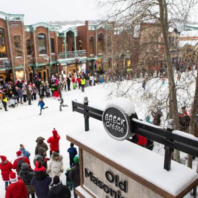 The community lines up on each side of Main Street Breckenridge for the annual Running of the Santas