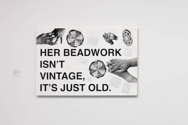 A multi-media artwork by Anna Tsouhlarakis that says, Her beadwork isn