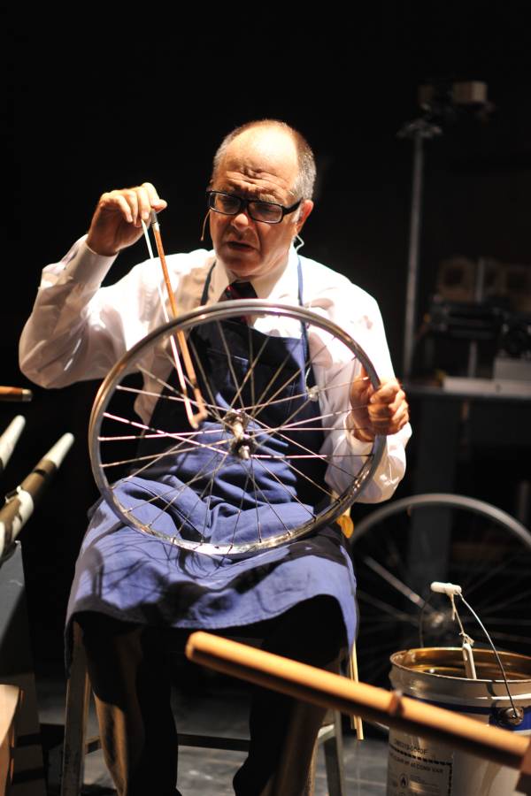 Percussionist and composer Stephen Schick creating sound by bowing a bicycle wheel