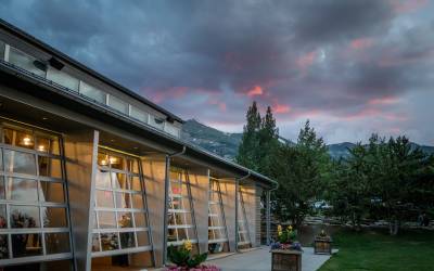 The Riverwalk Center in Breckenridge Colorado is shown at sunset. The venue sits at the base of the 10-mile mountain range and hosts live events, including musicians, comedy, spoken word and performing arts.