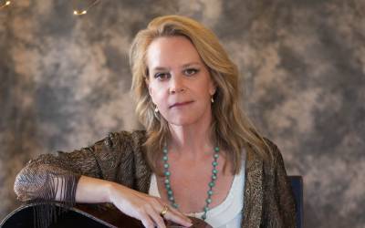 Musician Mary Chapin Carpenter with her guitar